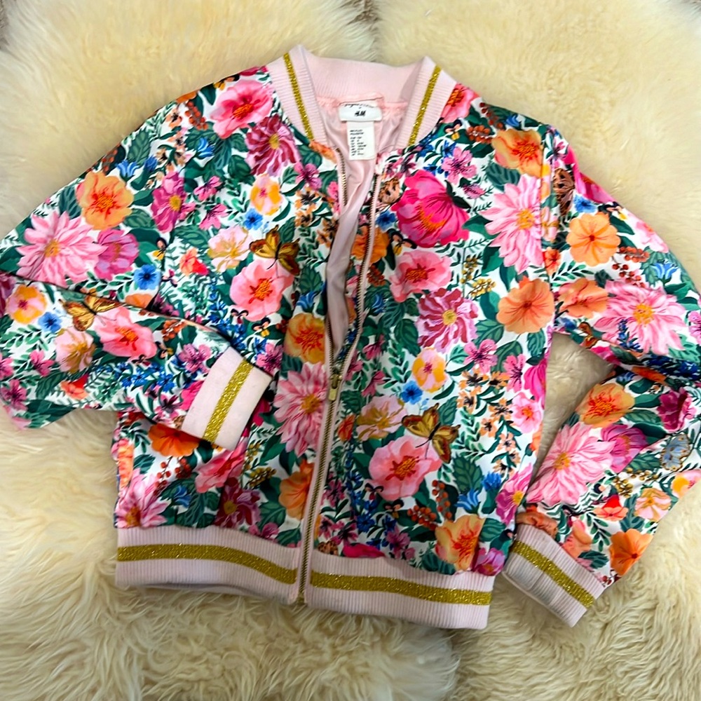 Used. Girls think jacket. Perfect for windy  spring and summer. Used few times.